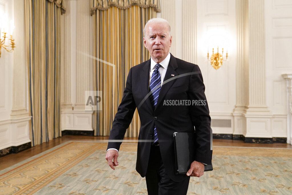 President Joe Biden walks out of the State Dining room after an event with Attorney General Merrick Garland at the White House in Washington, Wednesday, June 23, 2021, to discuss gun crime prevention strategy. (AP Photo/Susan Walsh)