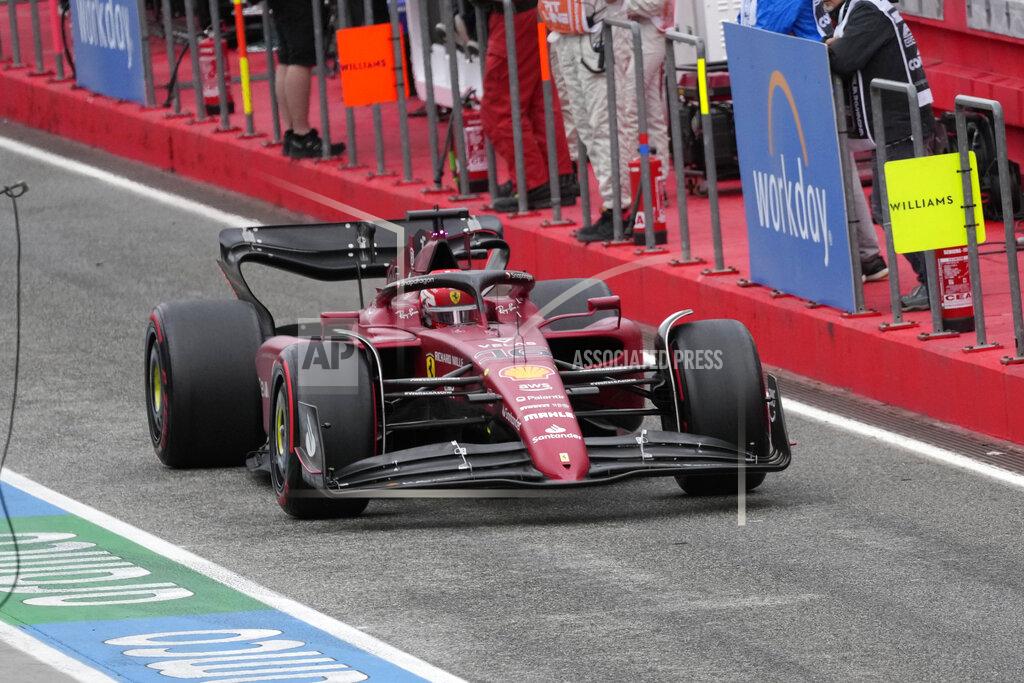 Luca Bruno Ferrari driver Charles Leclerc of Monaco steers his car after stopping at pit during the Emilia Romagna Formula One Grand Prix, at the Enzo and Dino Ferrari racetrack, in Imola, Italy, Sunday, April 24, 2022. (AP Photo/Luca Bruno)