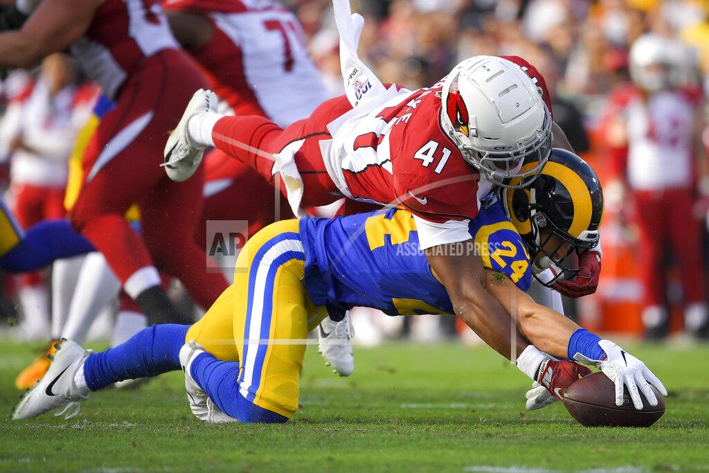 Mark J. Terrill Los Angeles Rams safety Taylor Rapp recovers a fumble against Arizona Cardinals running back Kenyan Drake during first half of an NFL football game Sunday, Dec. 29, 2019, in Los Angeles. (AP Photo/Mark J. Terrill)