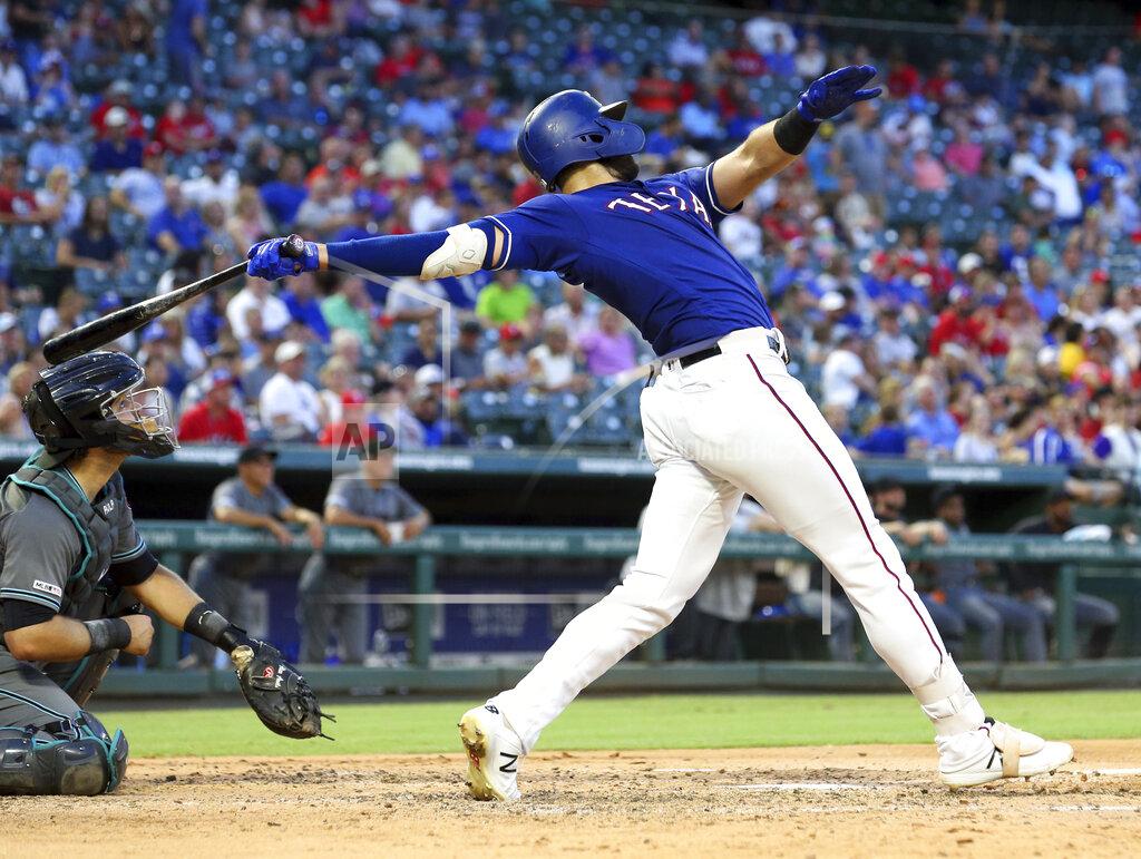 Richard W. Rodriguez FILE - In this July 16, 2019, file photo, Texas Rangers' Joey Gallo follows through on a solo home run in the fourth inning of a baseball game against the Arizona Diamondbacks in Arlington, Texas. (AP Photo/Richard W. Rodriguez, File)
