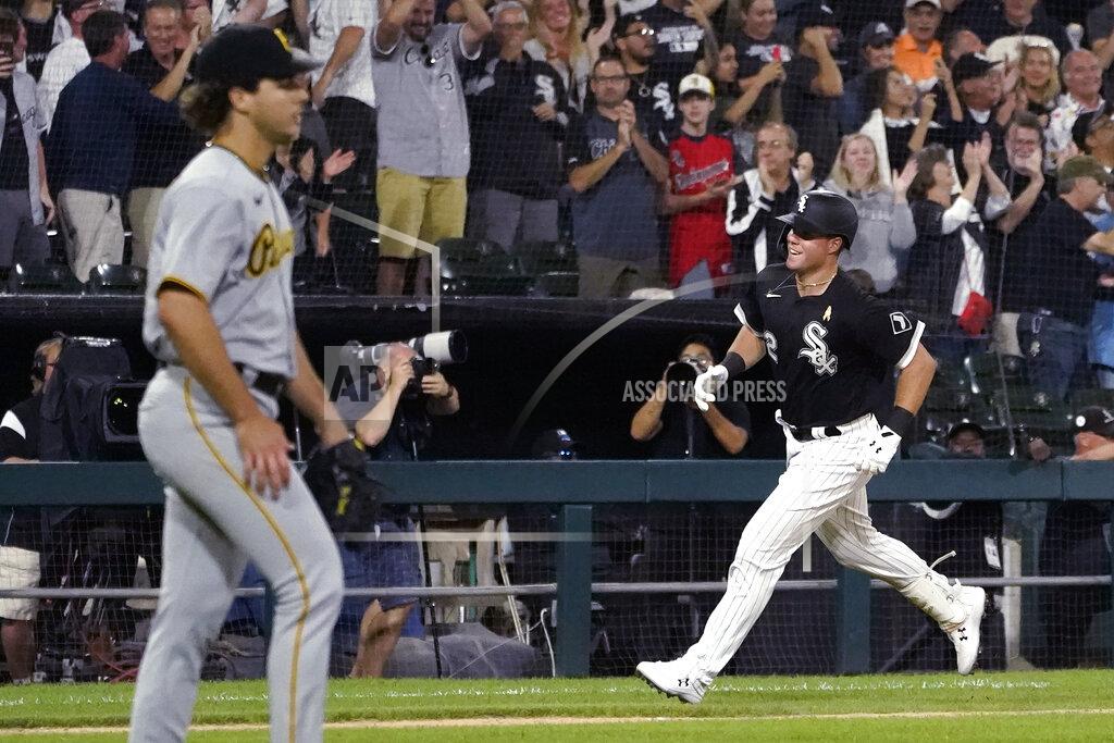 Charles Rex Arbogast Chicago White Sox's Gavin Sheets, right, heads home after his three-run home run off Pittsburgh Pirates starting pitcher Max Kranick, left, during the fourth inning of a baseball game Wednesday, Sept. 1, 2021, in Chicago. (AP Photo/Charles Rex Arbogast)