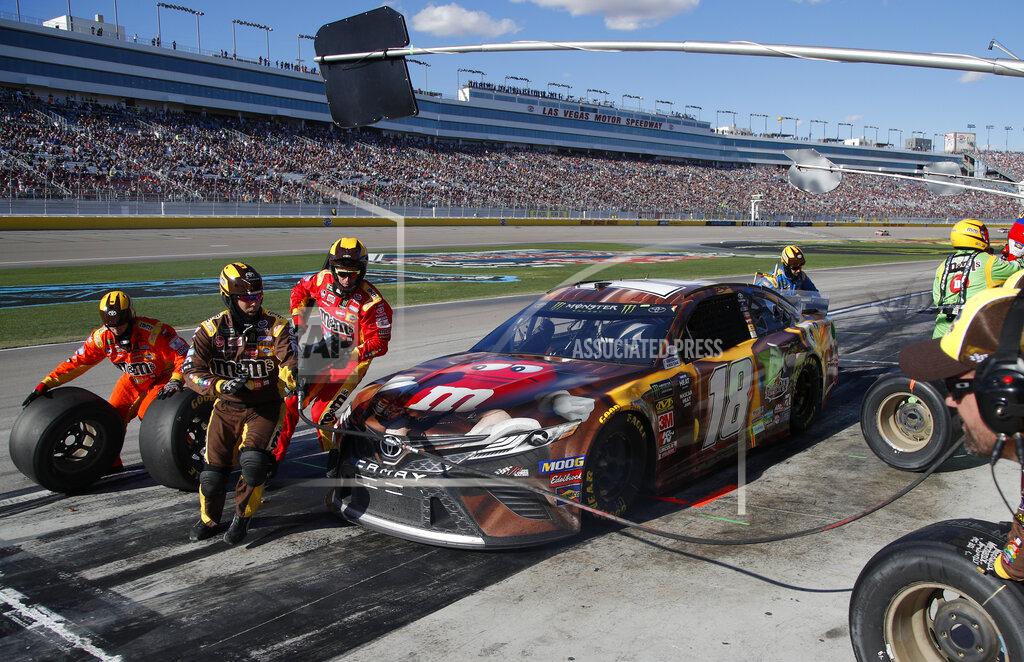 John Locher Kyle Busch makes a pit stop during a NASCAR Cup Series auto race at Las Vegas Motor Speedway, Sunday, March 3, 2019, in Las Vegas. (AP Photo/John Locher)