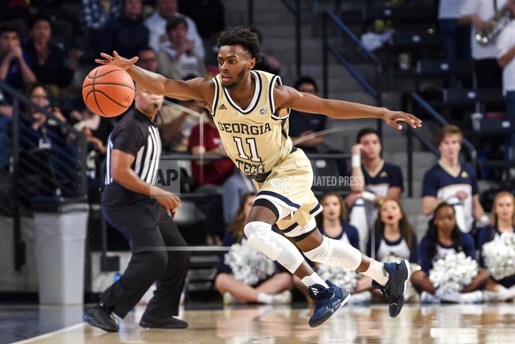 Danny Karnik Georgia Tech guard Bubba Parham (11) reaches for the ball in the first half of an NCAA college basketball game against Arkansas Monday, Nov. 25, 2019, in Atlanta. (AP Photo/Danny Karnik)