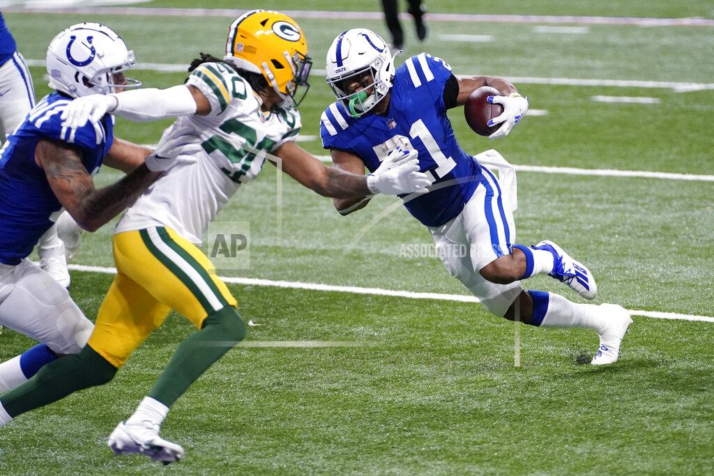 Aj Mast Indianapolis Colts' Nyheim Hines (21) rushes for a two-point conversion during the second half of an NFL football game against the Green Bay Packers, Sunday, Nov. 22, 2020, in Indianapolis. (AP Photo/AJ Mast)