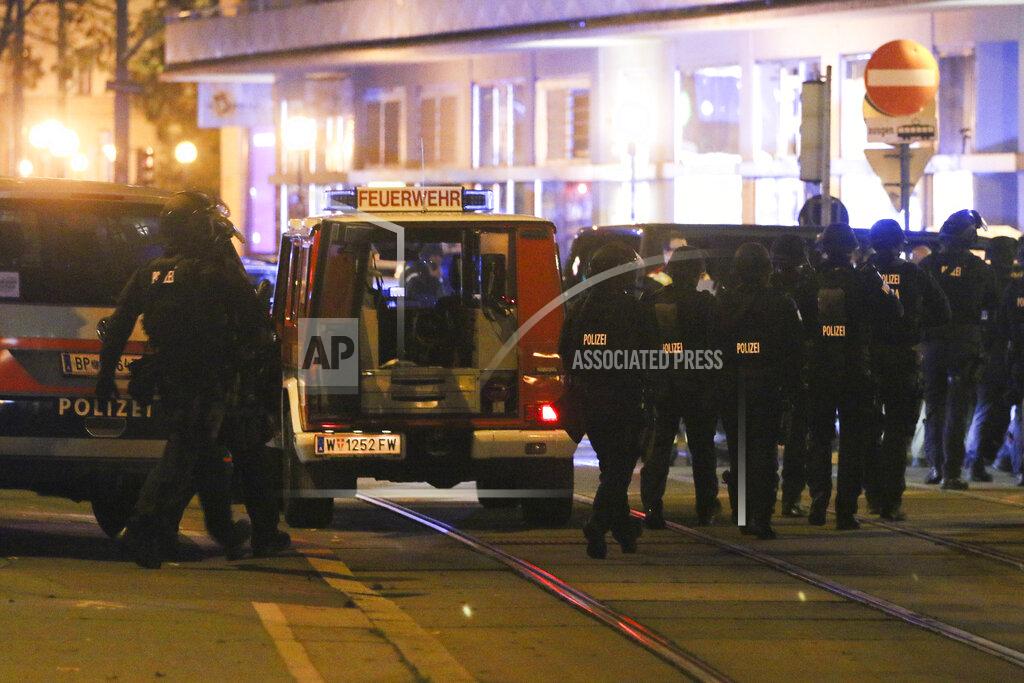 Ronald Zak Police officers walk at the scene after gunshots were heard, in Vienna, Monday, Nov. 2, 2020. Austrian police say several people have been injured and officers are out in force following gunfire in the capital Vienna. Initial reports that a synagogue was the target of an attack couldn't immediately be confirmed. Austrian news agency APA quoted the country's Interior Ministry saying one attacker has been killed and another could be on the run.(Photo/Ronald Zak)