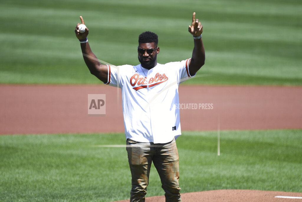 Terrance Williams Baltimore Ravens' Tyus Bowser prepares to throw out the ceremonial first pitch before a baseball game between the Baltimore Orioles and the Tampa Bay Rays, Sunday, Aug. 8, 2021, in Baltimore. (AP Photo/Terrance Williams)
