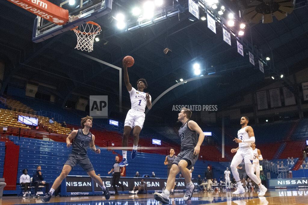 Evert Nelson Kansas' Tyon Grant-Foster goes up for a layup against Washburn during an NCAA college basketball game Thursday, Dec. 3, 2020, in Lawrence, Kan. (Evert Nelson/The Topeka Capital-Journal via AP)