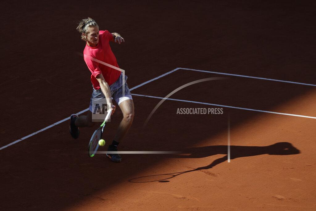 Sebastian Korda of the U.S. plays a shot against Spain's Rafael Nadal in the fourth round match of the French Open tennis tournament at the Roland Garros stadium in Paris, France, Sunday, Oct. 4, 2020. (AP Photo/Alessandra Tarantino)