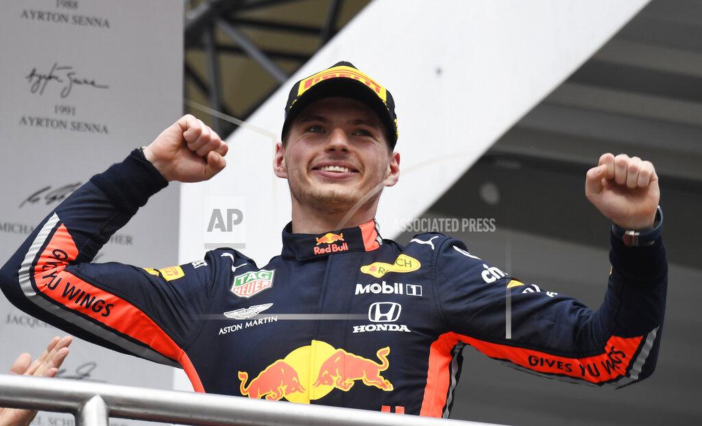 Jens Meyer Red Bull driver Max Verstappen of the Netherland's celebrates on the podium after he won the German Formula One Grand Prix at the Hockenheimring racetrack in Hockenheim, Germany, Sunday, July 28, 2019. (AP Photo/Jens Meyer)