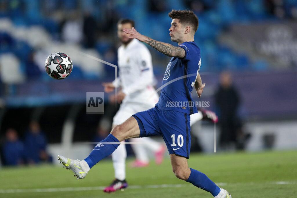 Bernat Armangue Chelsea's Christian Pulisic reaches for the ball during the Champions League semifinal first leg soccer match between Real Madrid and Chelsea at the Alfredo di Stefano stadium in Madrid, Spain, Tuesday, April 27, 2021. (AP Photo/Bernat Armangue)