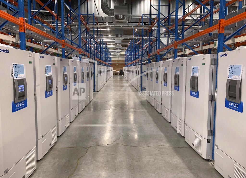 Uncredited This handout photo taken in Oct. 2020 and provided by Pfizer shows part of a "freezer farm," a football field-sized facility for storing finished COVID-19 vaccines, in Puurs, Belgium. Pfizer's experimental vaccine requires ultra-cold storage and are being stored in special freezers until approval and distribution. Pfizer Inc. said Monday, Nov. 9, 2020 that its COVID-19 vaccine may be a remarkable 90% effective, based on early and incomplete test results that nevertheless brought a big burst of optimism to a world desperate for the means to finally bring the catastrophic outbreak under control. (Pfizer via AP)