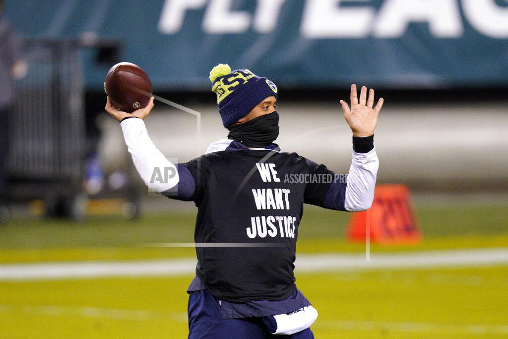 Chris Szagola Seattle Seahawks' Russell Wilson warms up before an NFL football game against the Philadelphia Eagles, Monday, Nov. 30, 2020, in Philadelphia. (AP Photo/Chris Szagola)