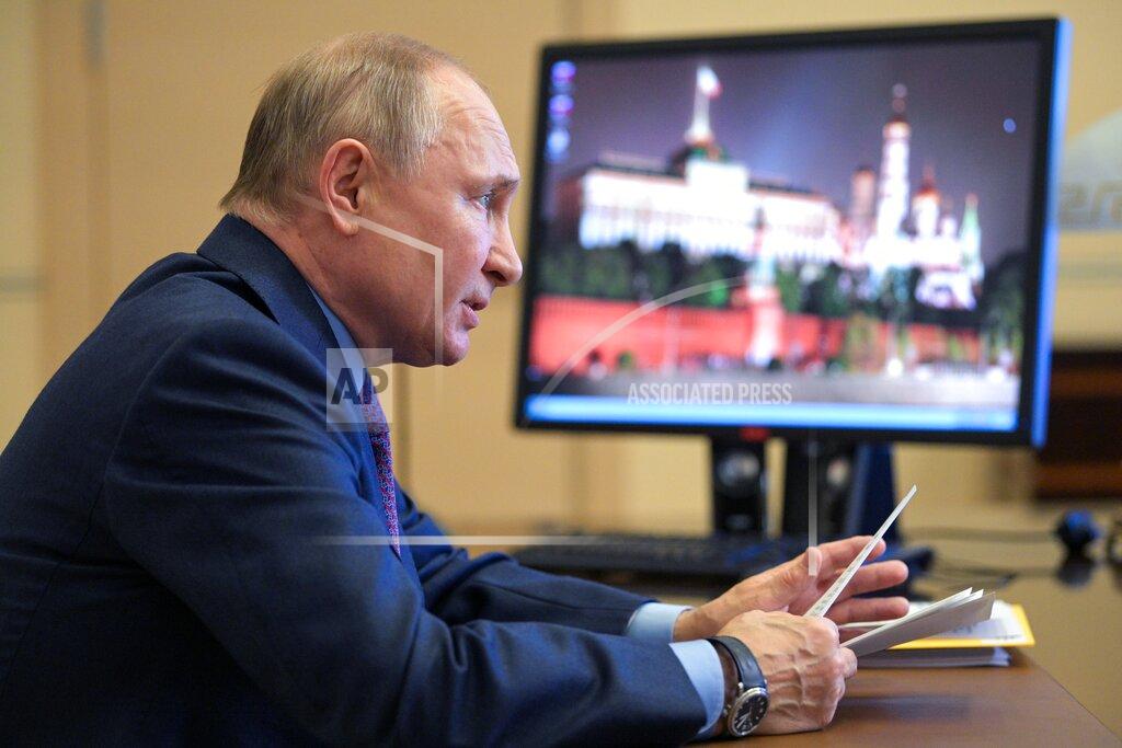 Alexei Druzhinin Russian President Vladimir Putin speaks during a meeting via video conference at the Novo-Ogaryovo residence outside Moscow, Russia, Thursday, April 15, 2021. (Alexei Druzhinin, Sputnik, Kremlin Pool Photo via AP)