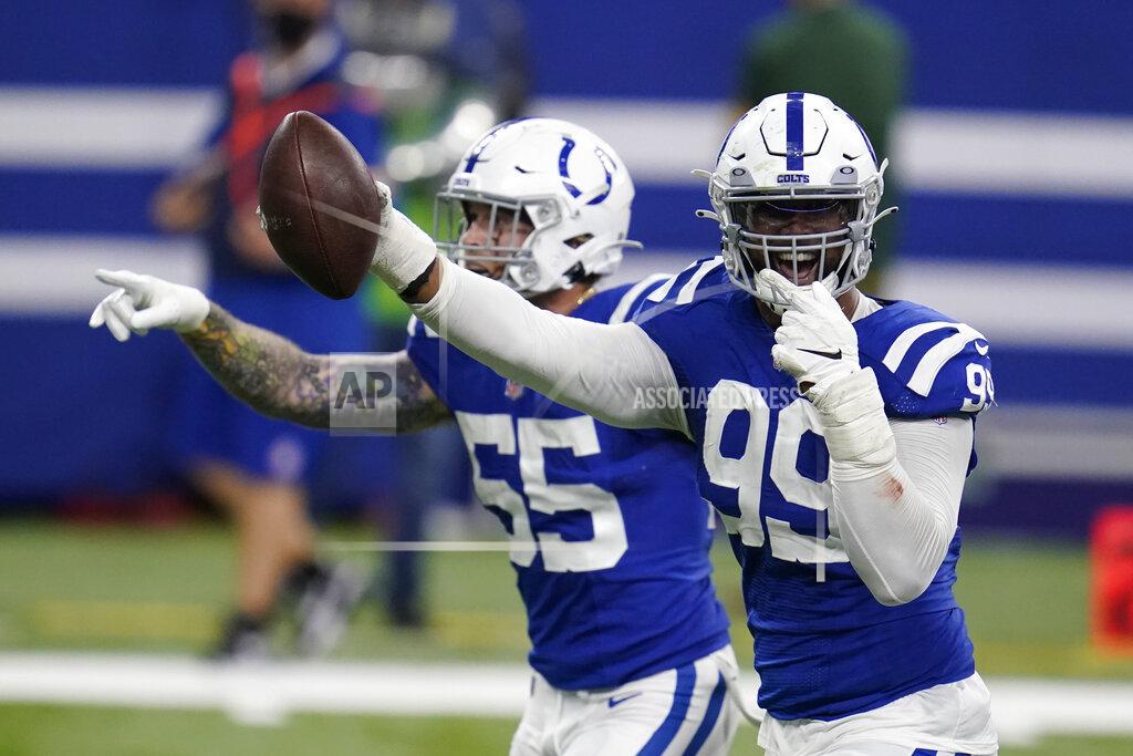 Michael Conroy Indianapolis Colts' DeForest Buckner (99) celebrates recovering a fumble during the overtime of an NFL football game against the Green Bay Packers, Sunday, Nov. 22, 2020, in Indianapolis. (AP Photo/Michael Conroy)