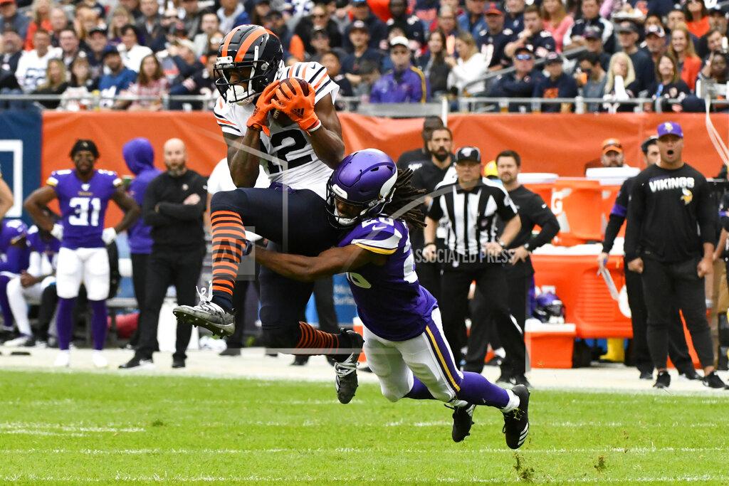 Matt Marton Chicago Bears wide receiver Allen Robinson (12) catches a pass as Minnesota Vikings cornerback Trae Waynes defends during the first half of an NFL football game Sunday, Sept. 29, 2019, in Chicago. (AP Photo/Matt Marton)
