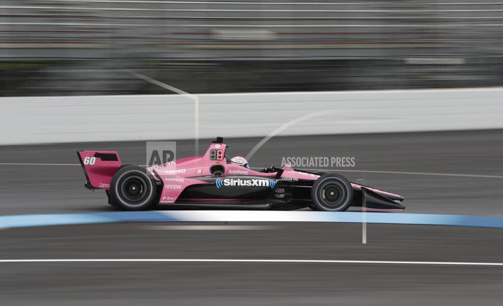 Michael Conroy Jack Harvey, of England, drives through a turn during practice for the Indy GP IndyCar auto race at Indianapolis Motor Speedway, Friday, May 10, 2019 in Indianapolis. (AP Photo/Michael Conroy)