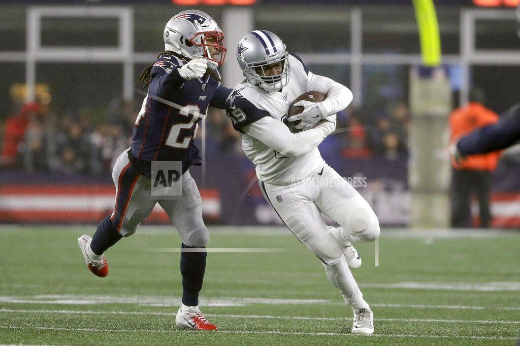 Steven Senne New England Patriots cornerback Stephon Gilmore, left, chases Dallas Cowboys wide receiver Amari Cooper in the second half of an NFL football game, Sunday, Nov. 24, 2019, in Foxborough, Mass. (AP Photo/Steven Senne)