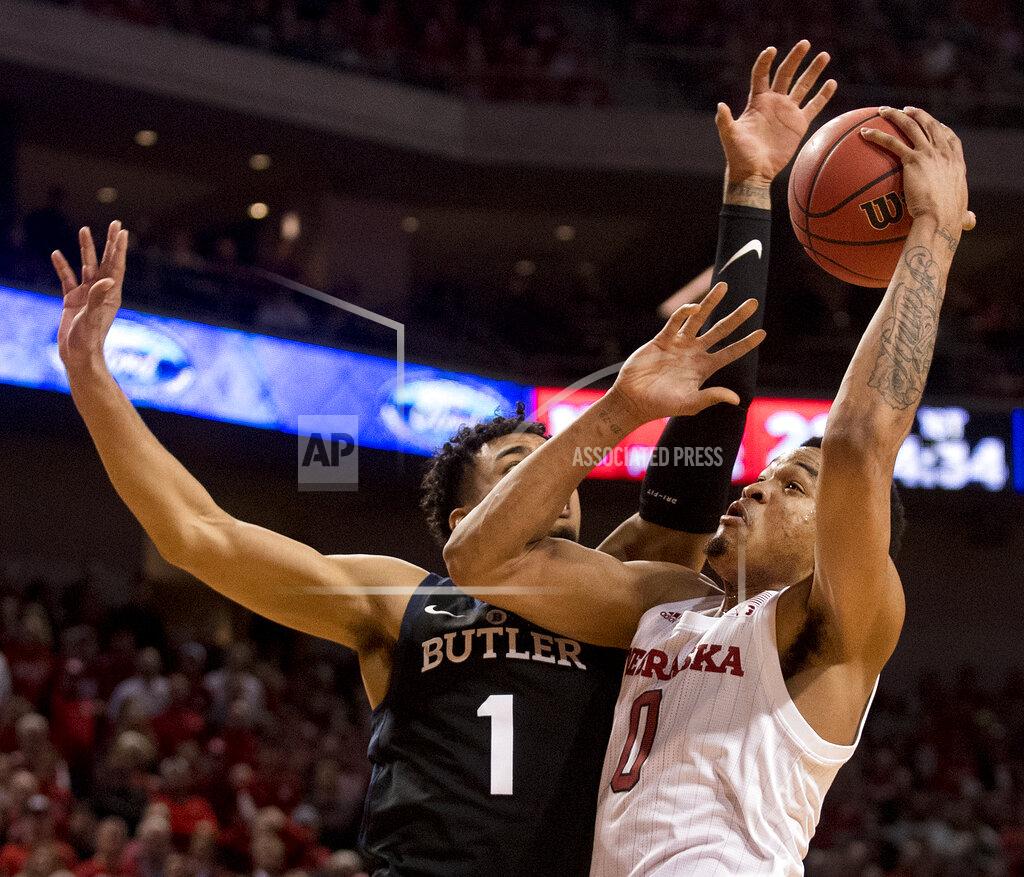 Francis Gardler Nebraska guard James Palmer Jr. (0) has the ball stripped by Butler's Jordan Tucker (1) during the first half of an NCAA college basketball game in the NIT on Wednesday, March 20, 2019, in Lincoln, Neb. (Francis Gardler/Lincoln Journal Star via AP)