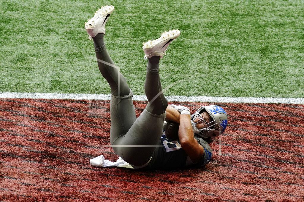 Brynn Anderson Detroit Lions tight end T.J. Hockenson (88) falls into the end zone for a touchdown against the Atlanta Falcons during the second half of an NFL football game, Sunday, Oct. 25, 2020, in Atlanta. The Detroit Lions won 23-22. (AP Photo/Brynn Anderson)