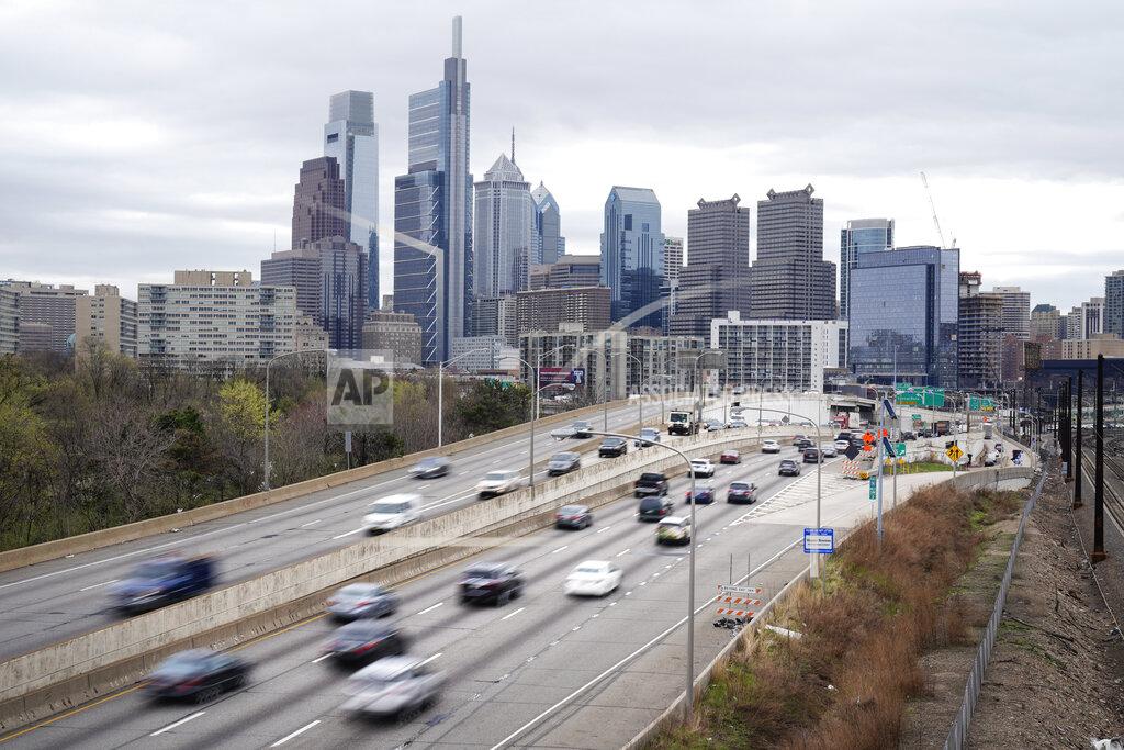 Matt Rourke Motor vehicle traffic moves along the Interstate 76 highway in Philadelphia, Wednesday, March 31, 2021. Looking beyond the $1.9 trillion COVID relief bill, President Joe Biden and lawmakers are laying the groundwork for another of his top legislative priorities — a long-sought boost to the nation's roads, bridges and other infrastructure that could meet GOP resistance to a hefty price tag. (AP Photo/Matt Rourke)