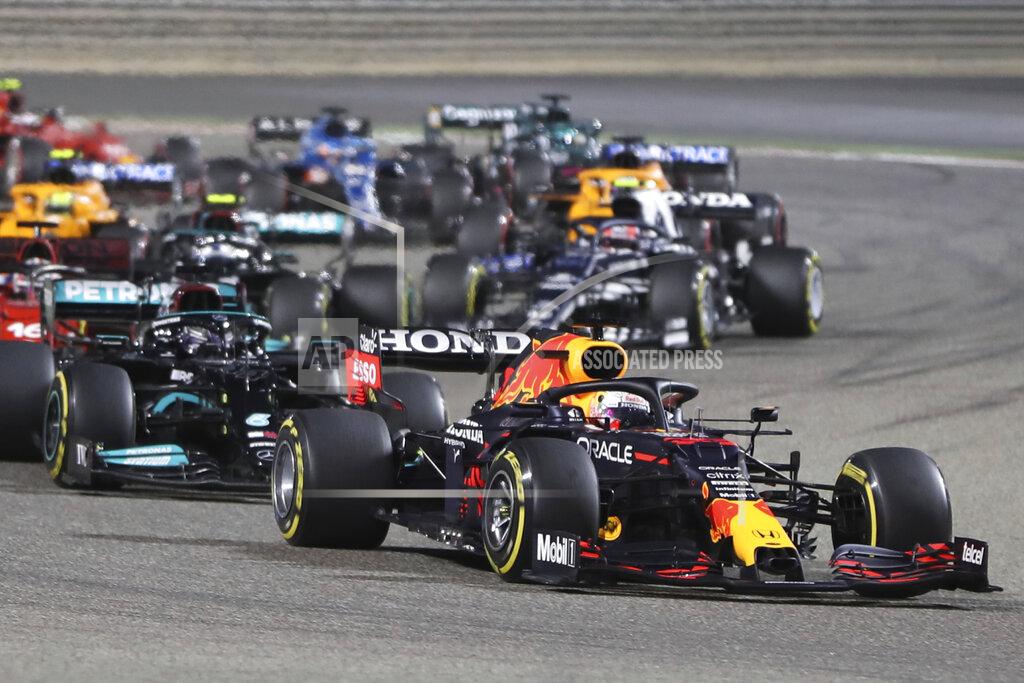 Kamran Jebreili Red Bull driver Max Verstappen of the Netherlands leads at the start of the Bahrain Formula One Grand Prix at the Bahrain International Circuit in Sakhir, Bahrain, Sunday, March 28, 2021. (AP Photo/Kamran Jebreili)