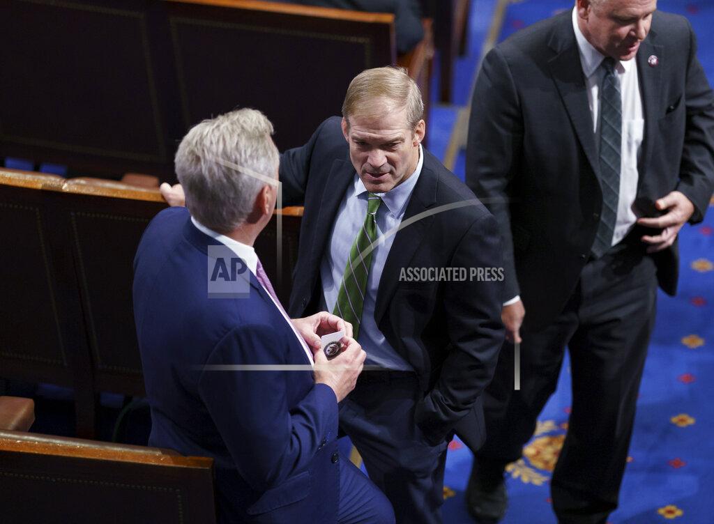 J. Scott Applewhite Rep. Jim Jordan, R-Ohio, center, speaks with House Minority Leader Kevin McCarthy, R-Calif., left, in the House chamber during the vote to create a select committee to investigate the Jan. 6 insurrection, at the Capitol in Washington, Wednesday, June 30, 2021. (AP Photo/J. Scott Applewhite)