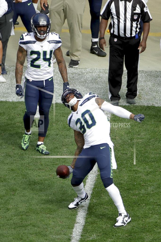 Gene J. Puskar Seattle Seahawks strong safety Bradley McDougald (30) celebrates after making an interception off Pittsburgh Steelers quarterback Mason Rudolph (2) in the second half of an NFL football game, Sunday, Sept. 15, 2019, in Pittsburgh. (AP Photo/Gene J. Puskar)