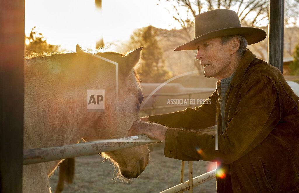 Claire Folger This image released by Warner Bros. Pictures shows Clint Eastwood in a scene from "Cry Macho." (Claire Folger/Warner Bros. Pictures via AP)