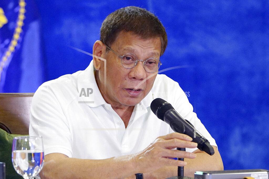 Joey Dalumpines In this Monday, Feb. 15, 2021, photo provided by the Malacanang Presidential Photographers Division, Philippine President Rodrigo Duterte gestures as he meets members of the Inter-Agency Task Force on the Emerging Infectious Diseases in Davao city, southern Philippines. The Philippine president has approved an amnesty program for Muslim and communist rebels who would agree to surrender their weapons as they return to normal life in the latest such attempt to tame rural insurgencies that have raged for half a century. (Joey Dalumpines/Malacanang Presidential Photographers Division via AP)
