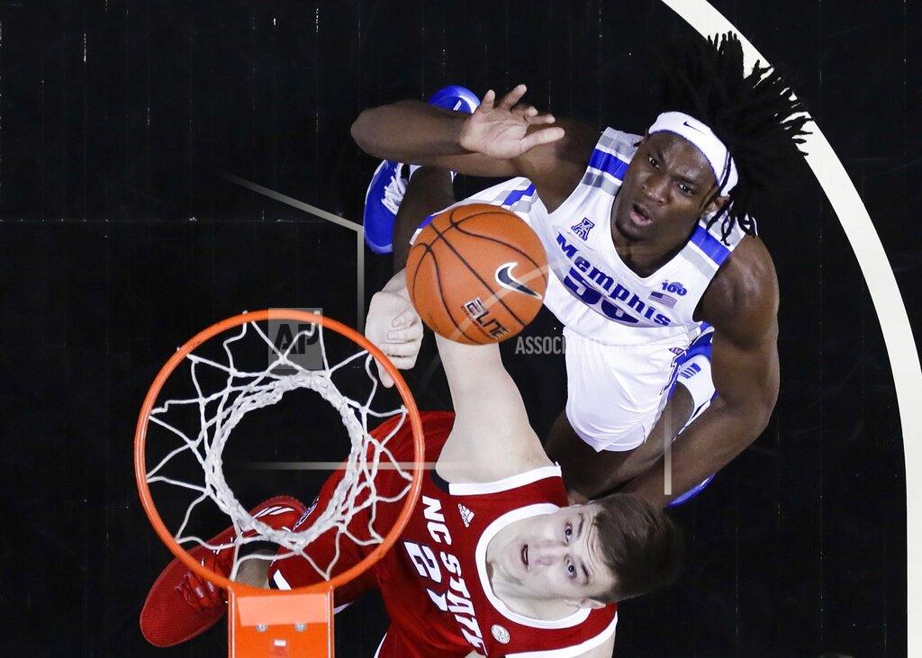 Frank Franklin Ii Memphis' Precious Achiuwa (55) shoots over North Carolina State's Danny Dixon (21) during the first half of an NCAA college basketball game in the Barclays Classic, Thursday, Nov. 28, 2019, in New York. (AP Photo/Frank Franklin II)
