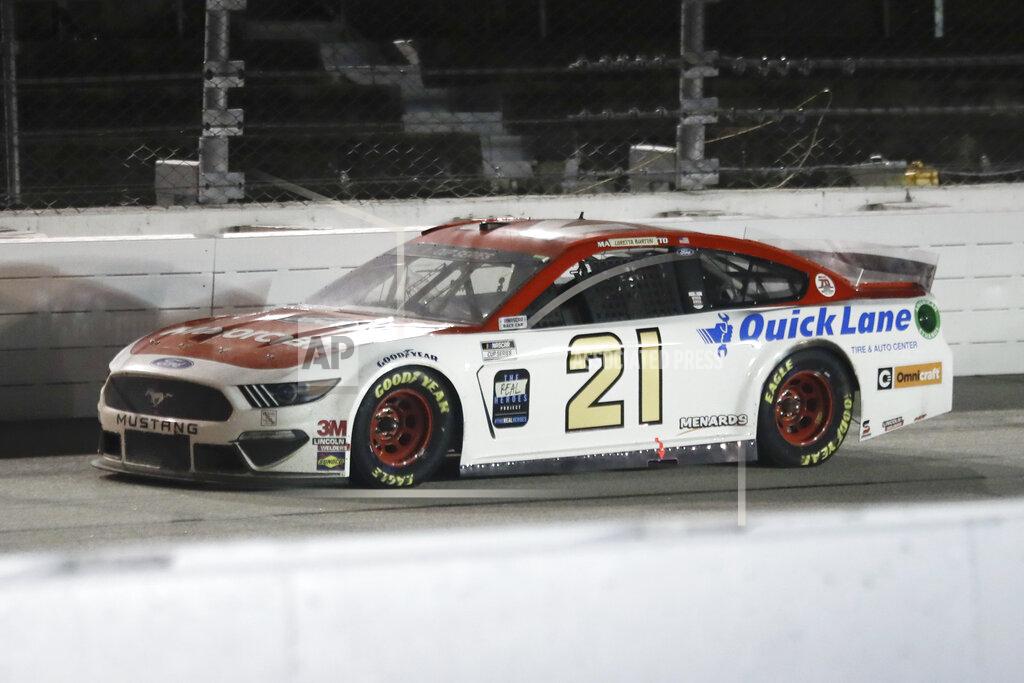 Brynn Anderson Matt DiBenedetto (21) drives during the NASCAR Cup Series auto race Wednesday, May 20, 2020, in Darlington, S.C. (AP Photo/Brynn Anderson)