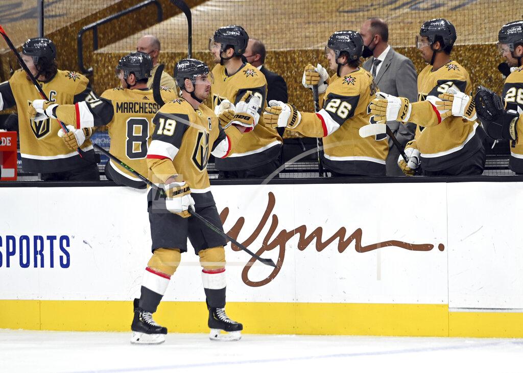 David Becker Vegas Golden Knights right wing Reilly Smith (19) celebrates with teammates after a goal against the St. Louis Blues during the third period of an NHL hockey game Saturday, May 8, 2021, in Las Vegas. (AP Photo/David Becker)