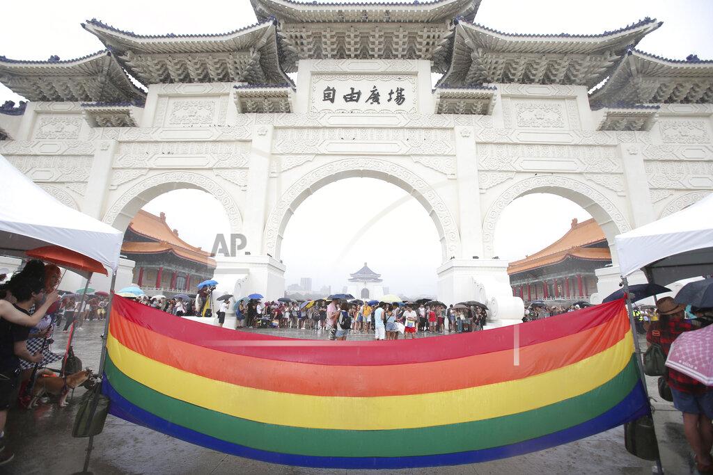 Chiang Ying-Ying Participants march during the "Taiwan Pride March for the World!" at Liberty Square at the CKS Memorial Hall in Taipei, Taiwan, Sunday, June 28, 2020. This year marks the first Gay Pride march in Chicago 1970, and due to the COVID-19 lockdown, Taiwan is one of the very few countries to host the world's only physical Gay Pride. (AP Photo/Chiang Ying-ying)