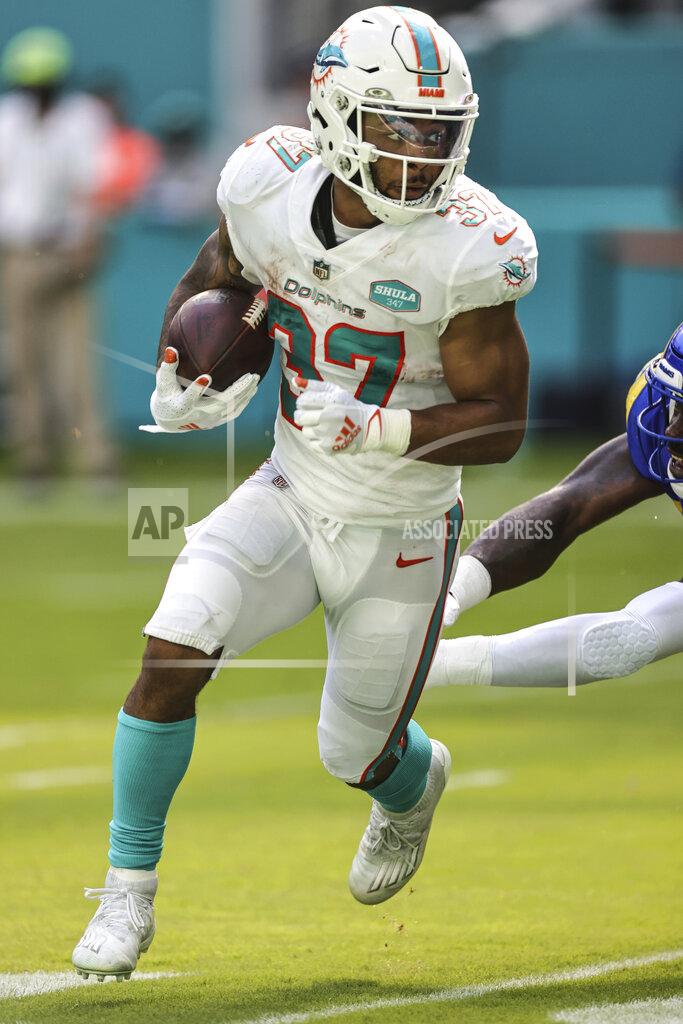 Margaret Bowles Miami Dolphins running back Myles Gaskin (37) carries the ball during an NFL game against the Los Angeles Rams, Sunday, Nov. 1, 2020 in Miami Gardens, Fla. The Dolphins defeated the Rams 28-17. (Margaret Bowles via AP)