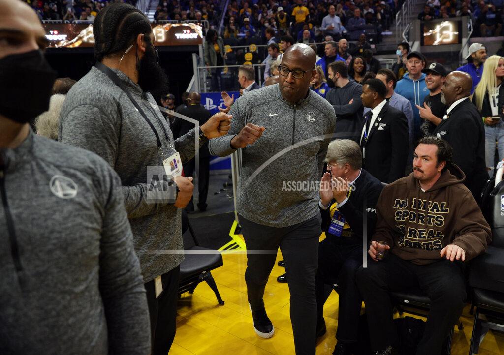 Carlos Avila Gonzalez Assistant coach Mike Brown enters the court to take the helm as Steve Kerr entered Covid protocols as the Golden State Warriors played the Memphis Grizzlies in Game 4 of the Western Conference Semifinals of the NBA Playoffs at Chase Center, in San Francisco, Calif., on Monday, May 9, 2022.(Carlos Avila Gonzalez/San Francisco Chronicle via AP)