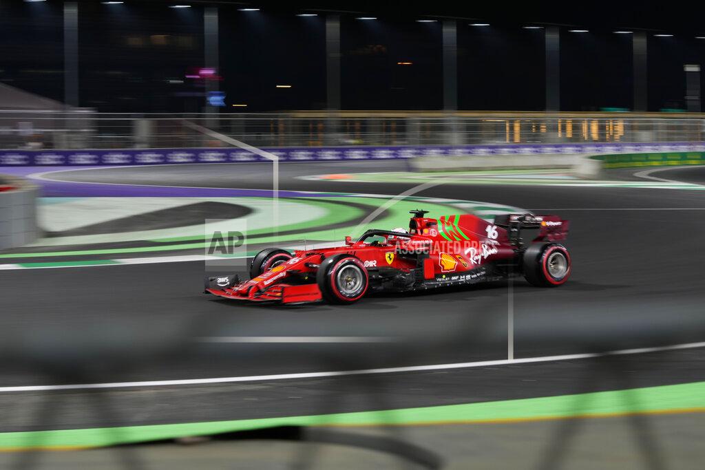 Hassan Ammar Ferrari driver Charles Leclerc of Monaco in action during practice session for the Saudi Arabian Grand Prix in Jiddah, Friday, Dec. 3, 2021. (AP Photo/Hassan Ammar)