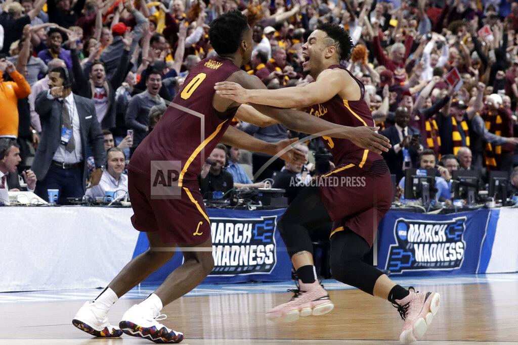 Tony Gutierrez FILE - In this March 15, 2018, file photo, Loyola-Chicago guard Donte Ingram (0) and Marques Townes, right, celebrate their 64-62 win over Miami in a first-round game at the NCAA college basketball tournament in Dallas. Their run to the Final Four as an 11 seed never seemed short of drama.(AP Photo/Tony Gutierrez, File)