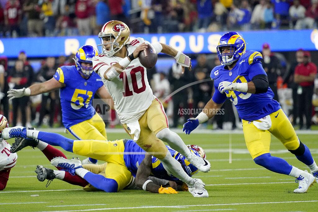 Mark J. Terrill San Francisco 49ers' Jimmy Garoppolo scrambles during the second half of the NFC Championship NFL football game against the Los Angeles Rams Sunday, Jan. 30, 2022, in Inglewood, Calif. The Rams won 20-17 to advance to the Super Bowl. (AP Photo/Mark J. Terrill)