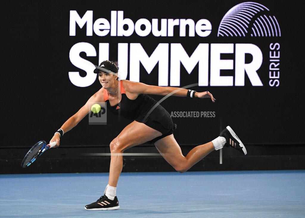 Andy Brownbill Spain's Garbine Muguruza makes a forehand return to Australia's Ash Barty in the final of the Yarra River Classic in Melbourne, Australia, Sunday, Feb. 7, 2021.(AP Photo/Andy Brownbill)