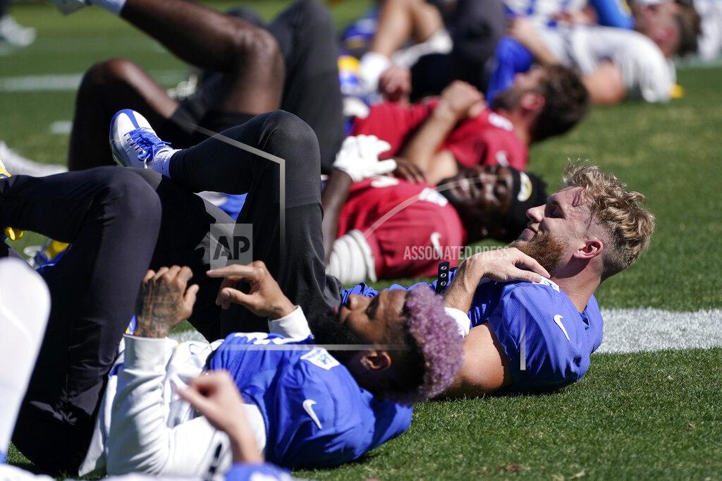 Mark J. Terrill Los Angeles Rams wide receiver Cooper Kupp, right and wide receiver Odell Beckham Jr., left, stretch during practice for an NFL Super Bowl football game Thursday, Feb. 10, 2022, in Pasadena, Calif. The Rams are scheduled to play the Cincinnati Bengals in the Super Bowl on Sunday. (AP Photo/Mark J. Terrill)