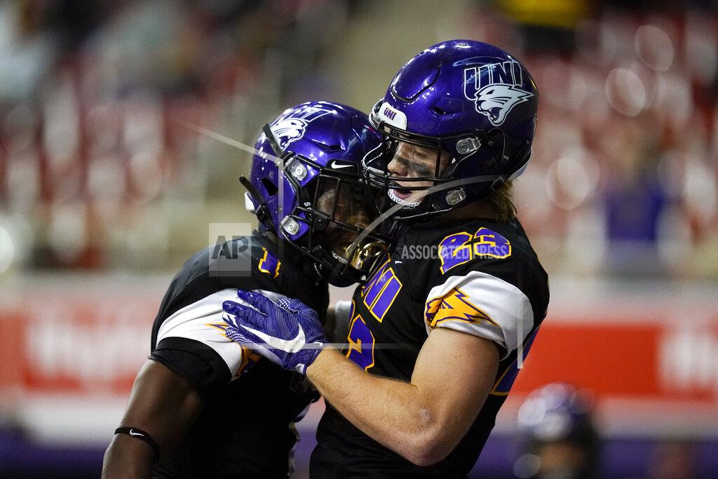 Charlie Neibergall Northern Iowa running back Sam Schnee (23) celebrates with teammate Deion McShane (1) after catching a 19-yard touchdown pass during the second half of an NCAA college football game against Southern Illinois, Saturday, Oct. 30, 2021, in Cedar Falls, Iowa. Northern Iowa won 23-16. (AP Photo/Charlie Neibergall)
