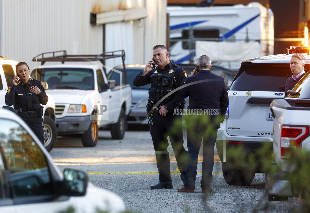 Nhat V. Meyer Law enforcement, including the San Mateo County Sheriff's Office, investigate a shooting off state Highway 92 in Half Moon Bay, Calif., Monday, Jan. 23, 2023. (Nhat V. Meyer/Bay Area News Group via AP)