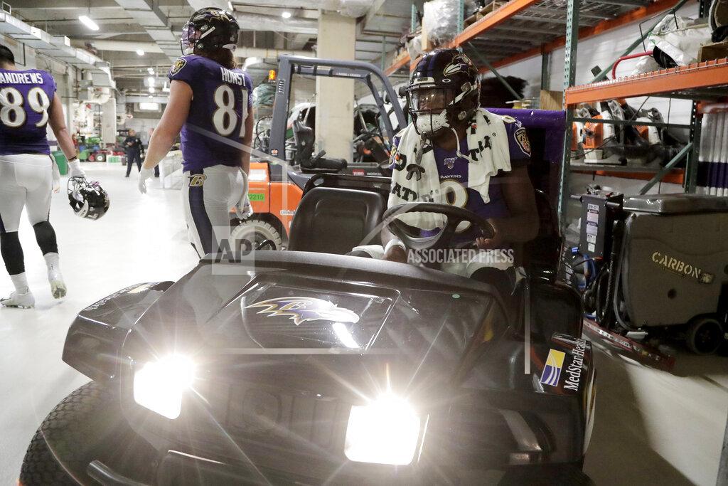 Julio Cortez Baltimore Ravens quarterback Lamar Jackson sits on a cart before taking the field prior to an NFL football game against the Cincinnati Bengals Sunday, Oct. 13, 2019, in Baltimore. (AP Photo/Julio Cortez)