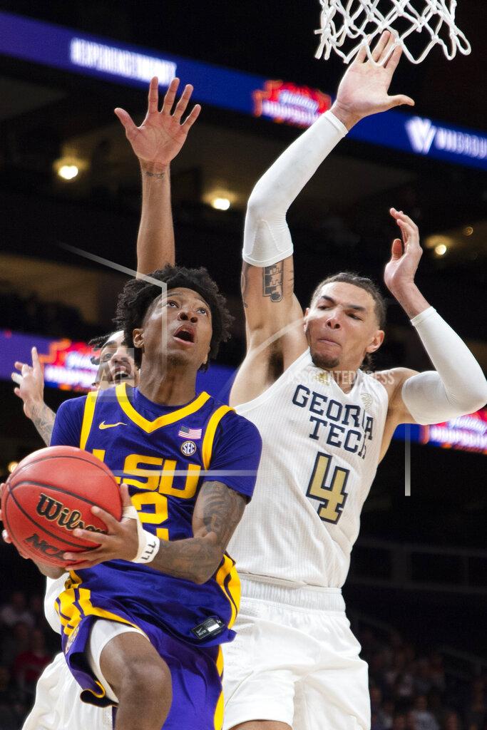 Georgia Tech guard Jordan Usher (4) defends against LSU guard Eric Gaines (2) during the second half of an NCAA college basketball game Saturday, Dec. 11, 2021, in Atlanta. (AP Photo/Hakim Wright Sr.)