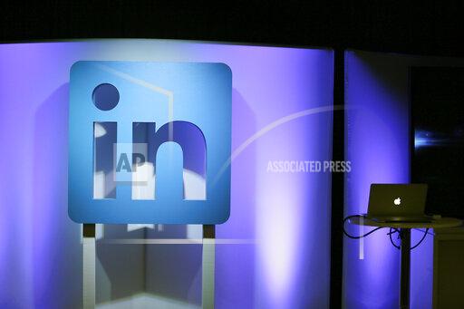 FILE - In this Thursday, Sept. 22, 2016, file photo, the LinkedIn logo is displayed during a product announcement in San Francisco. Microsoft says it is shutting down its LinkedIn service in China later this year following tighter government censorship rules. The company said in a blog post Thursday, Oct. 14, 2021, it has faced “a significantly more challenging operating environment and greater compliance requirements in China.” (AP Photo/Eric Risberg, File)
