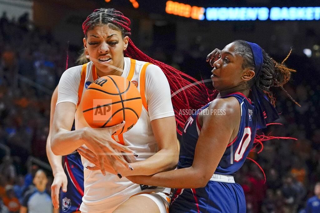 Mark Humphrey Tennessee's Tamari Key, left, and Belmont's Tuti Jones (0) battle for a rebound in the second half of a women's college basketball game in the second round of the NCAA tournament Monday, March 21, 2022, in Knoxville, Tenn. Tennessee won 70-67. (AP Photo/Mark Humphrey)