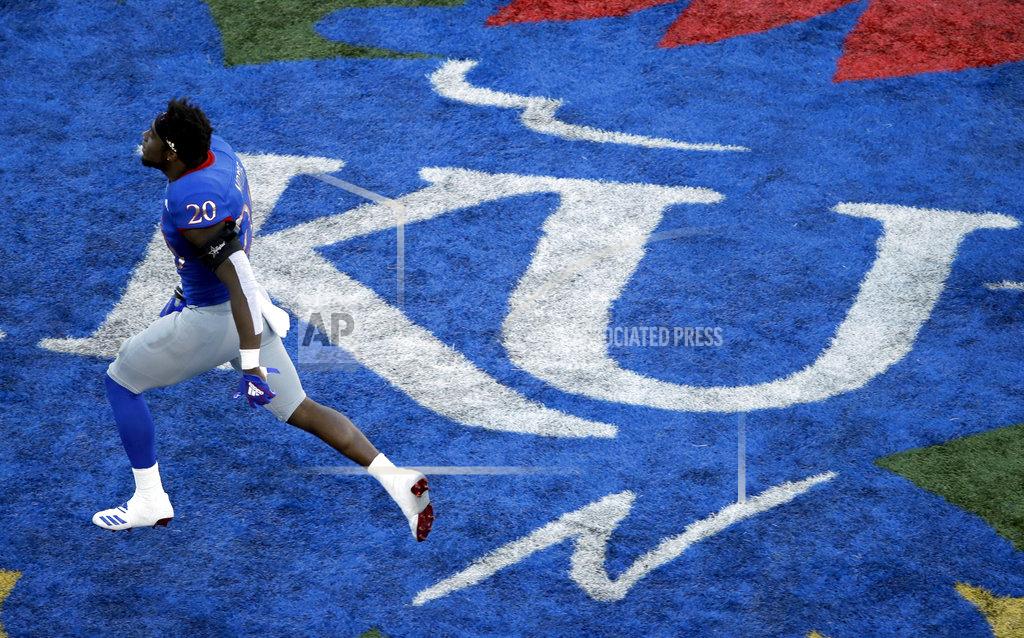 Orlin Wagner Kansas safety Emmanuel Moore (20) celebrates following an NCAA college football game against TCU in Lawrence, Kan., Saturday, Oct. 27, 2018. Kansas defeated TCU 27-26. (AP Photo/Orlin Wagner)