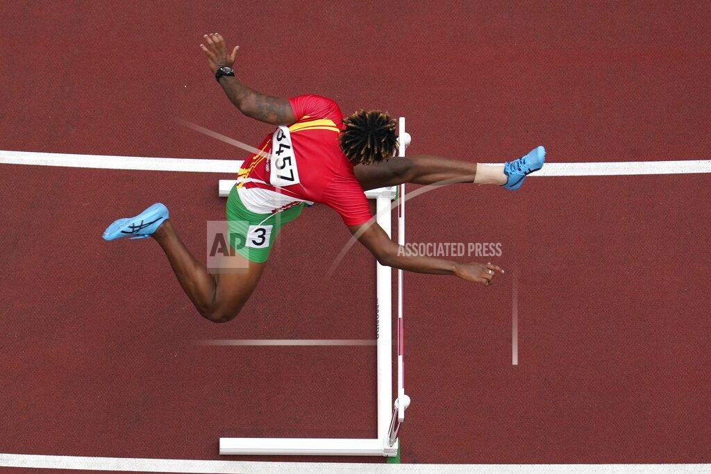 Morry Gash Ned Azemia, of Seychelles, competes during the first round of the men's 400-meter hurdles at the 2020 Summer Olympics, Friday, July 30, 2021, in Tokyo. (AP Photo/Morry Gash)