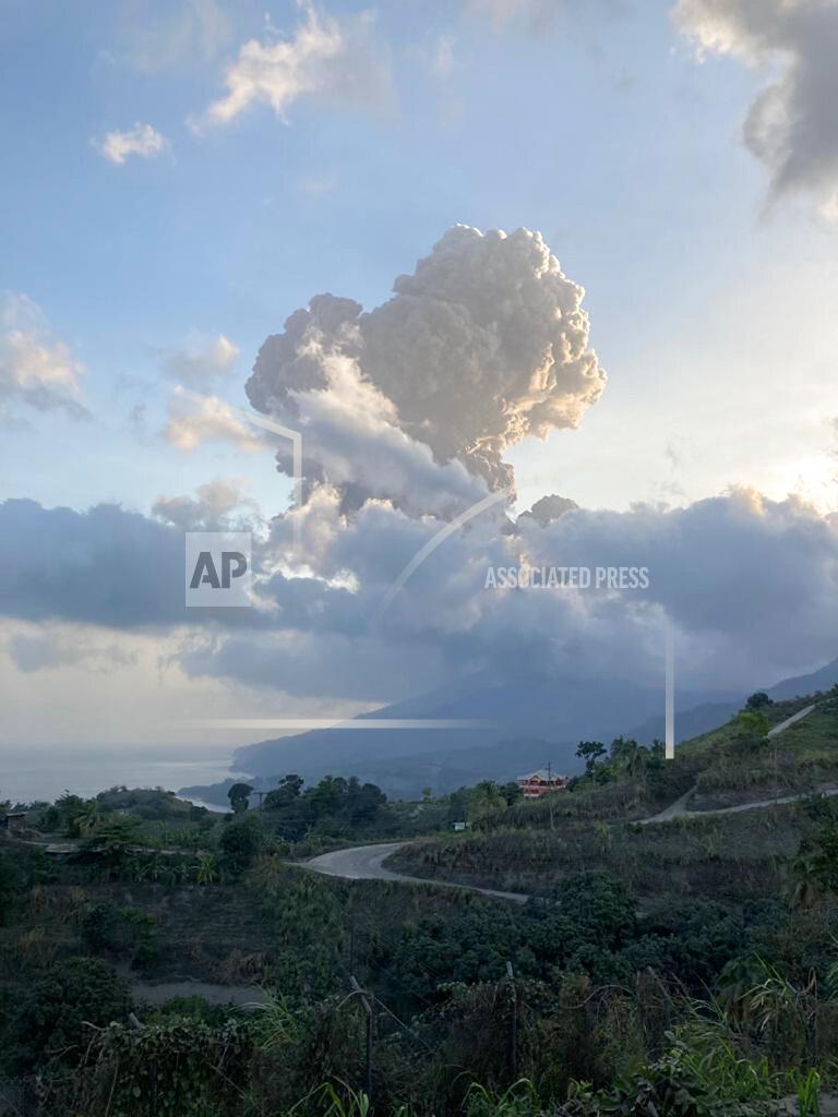 Vincie Richie Plumes of ash rise from the La Soufriere volcano on the eastern Caribbean island of St. Vincent, Friday, April 16, 2021. (Vincie Richie/The University of the West Indies Seismic Research Centre via AP)