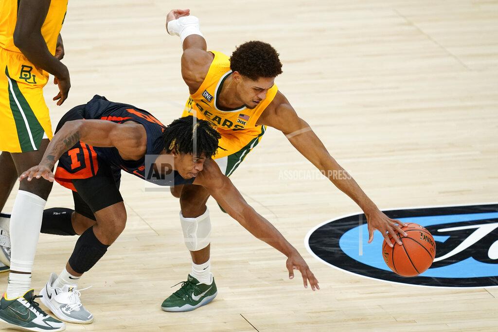 Darron Cummings Baylor's MaCio Teague, right, and Illinois' Adam Miller go for a loose ball during the second half of an NCAA college basketball game Wednesday, Dec. 2, 2020, in Indianapolis. (AP Photo/Darron Cummings)